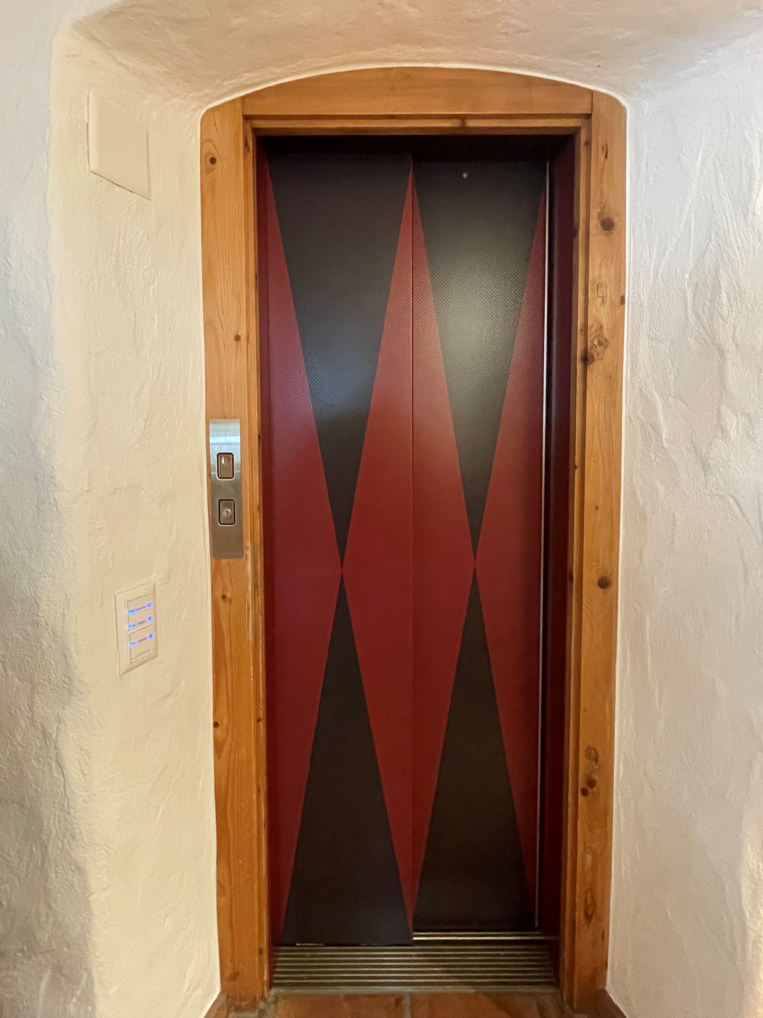Alexander  Garda - Red and Black Elevator Doors EG