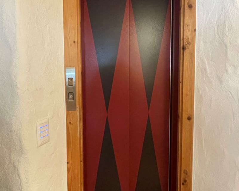 Alexander  Garda - Red and Black Elevator Doors EG